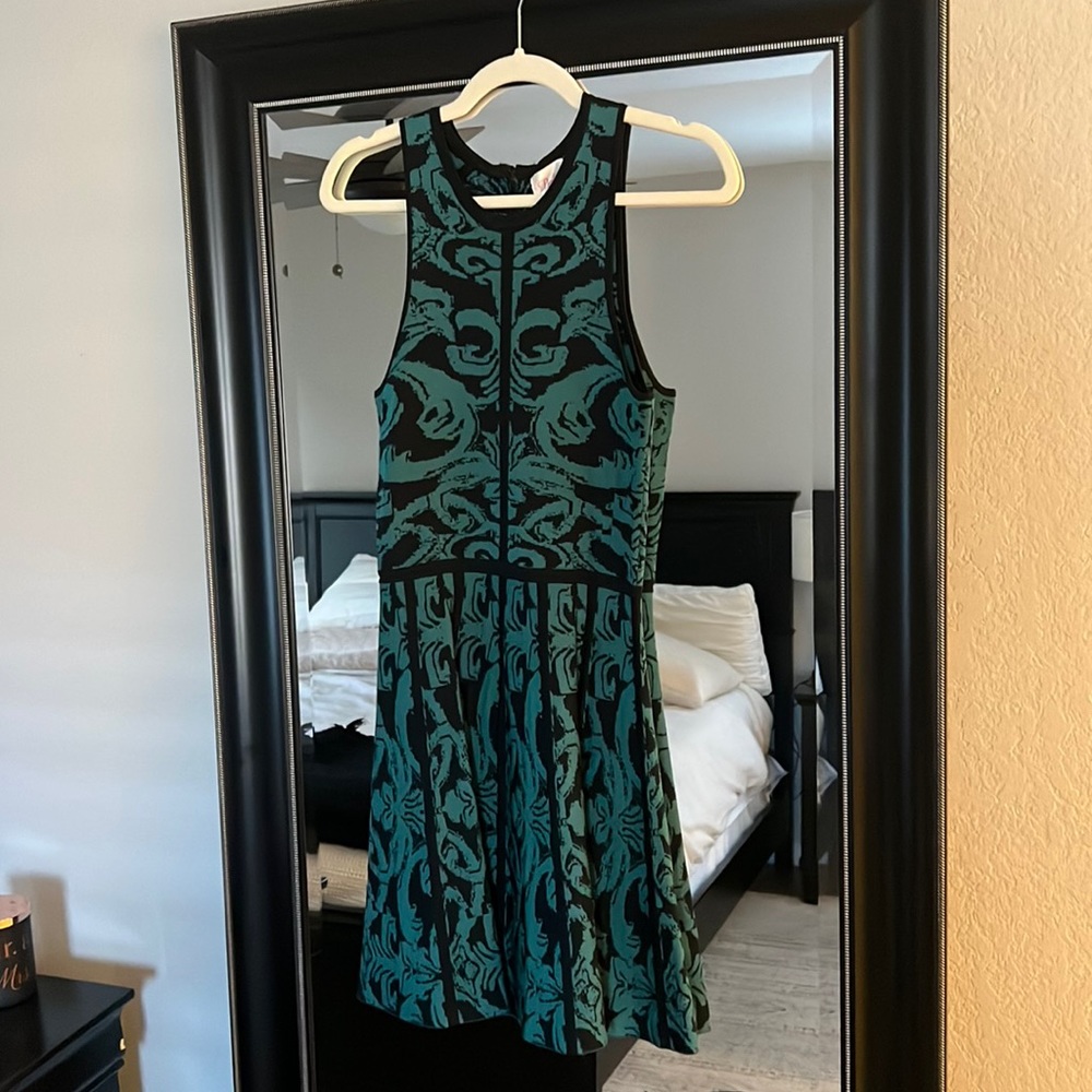 Green and black paisley mini dress